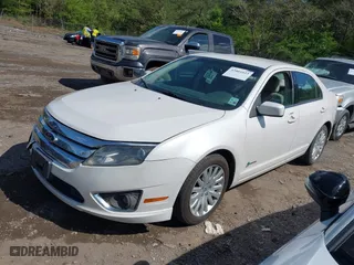 2011 Ford Fusion Hybrid with VIN 3FADP0L33BR116725, listed as a IAAI auction lot 42001023 with 172,845 mi miles. Bid and sale history available at carsss.com. Image 2.