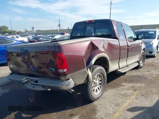 2002 Ford F-150 XL with VIN 1FTRX17L82KB68307, listed as a IAAI auction lot 40642958 with 115,737 mi miles. Bid and sale history available at carsss.com. Image 4.