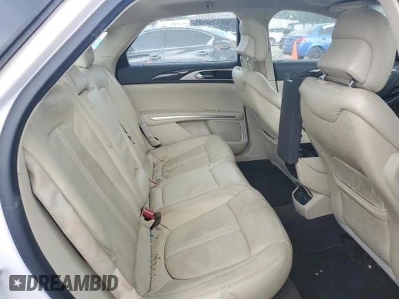 2014 Lincoln MKZ z VIN 3LN6L2GK9ER825882, wystawiony jako Copart lot #53332435 z przebiegiem 114 677 mil mil oraz Szkoda całkowita • Salvage title. Historia ofert i sprzedaży dostępna na DreamBid. Obrazek 10.