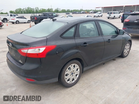 2012 Ford Focus SE with VIN 1FAHP3F21CL372769, listed as a IAAI auction lot 42107424 with 202,142 mi miles. Bid and sale history available at carsss.com. Image 4.