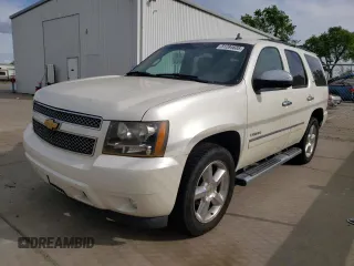 2012 Chevrolet Tahoe LTZ z VIN 1GNSCCE04CR213048, wystawiony jako Copart lot #51284685 z przebiegiem 192 733 mil mil oraz Czysty tytuł • Clean title. Historia ofert i sprzedaży dostępna na DreamBid. Obrazek 1.