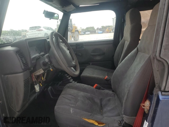 2003 Jeep Wrangler X with VIN 1J4FA39S93P315950, listed as a Copart auction lot 59563295 with Not provided miles and Salvage title. Bid and sale history available at DreamBid. Image 7.