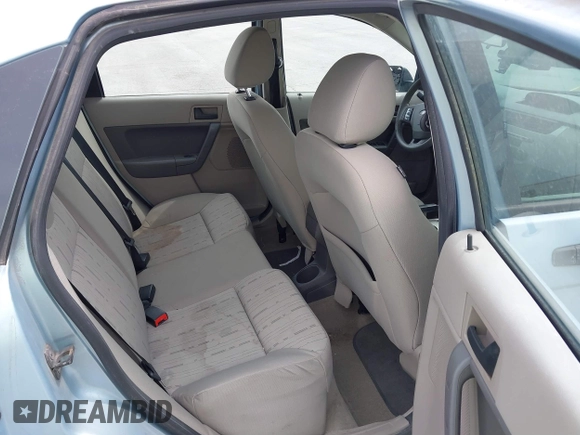 2009 Ford Focus SE with VIN 1FAHP35N59W157060, listed as a IAAI auction lot 41871757 with 141,558 mi miles. Bid and sale history available at carsss.com. Image 8.