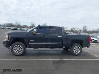 2015 Chevrolet Silverado 2500HD Built After Aug 14 High Country with VIN 1GC1KXE84FF536963, listed as a IAAI auction lot 41439878 with 191,471 mi miles. Bid and sale history available at carsss.com. Image 14.