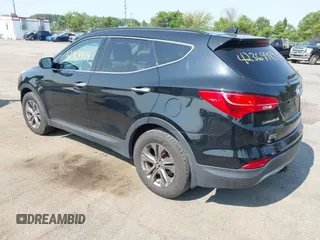2014 Hyundai Santa Fe with VIN 5XYZUDLB9EG187420, listed as a IAAI auction lot 42369989 with 181,713 mi miles and . Bid and sale history available at DreamBid. Image 3.
