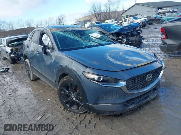 2023 Mazda CX-30 2.5 S Carbon Edition with VIN 3MVDMBCM5PM560926, listed as a IAAI auction lot 41488087 with 26,035 mi miles. Bid and sale history available at carsss.com. Image 1.
