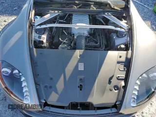 2014 Aston Martin Vantage z VIN SCFEKBBK3EGD18661, wystawiony jako Copart lot #86366204 z przebiegiem 14 863 mil mil oraz Szkoda całkowita • Salvage title. Historia ofert i sprzedaży dostępna na DreamBid. Obrazek 11.