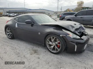 2014 Nissan 370Z Nismo with VIN JN1AZ4EH3EM633305, listed as a Copart auction lot 42846795 with 45,430 mi miles and Salvage Title. Bid and sale history available at DreamBid. Image 4.