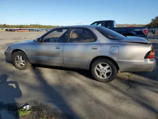 1995 Lexus ES 300 с VIN JT8GK13TXS0121401, выставлен на аукционе Copart как лот 74987404 с пробегом 90 900 миль миль и Списание • Salvage title. История ставок и продаж доступна на DreamBid. Изображение 2.