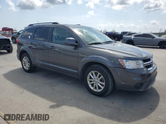 2014 Dodge Journey SXT with VIN 3C4PDCBG8ET140984, listed as a Copart auction lot 54408445 with 135,290 mi miles and Salvage Title. Bid and sale history available at DreamBid. Image 4.