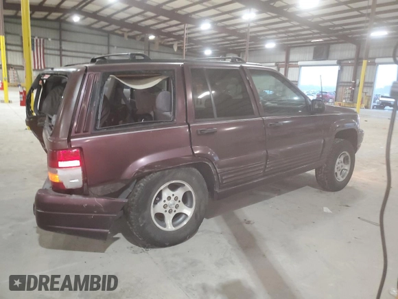 1996 Jeep Grand Cherokee Laredo with VIN 1J4EX58S5TC133225, listed as a Copart auction lot 49132214 with 233,886 mi miles and Non Repairable. Bid and sale history available at carsss.com. Image 3.