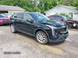 2019 Cadillac XT4 AWD Luxury z VIN 1GYFZBR41KF150209, wystawiony jako IAAI lot #42325529 z przebiegiem 76 828 mil mil oraz . Historia ofert i sprzedaży dostępna na DreamBid. Obrazek 1.