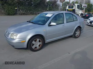 1999 Volkswagen Jetta z VIN 3VWSC29M9XM067508, wystawiony jako IAAI lot #41905002 z przebiegiem 32 051 mil mil oraz . Historia ofert i sprzedaży dostępna na DreamBid. Obrazek 2.