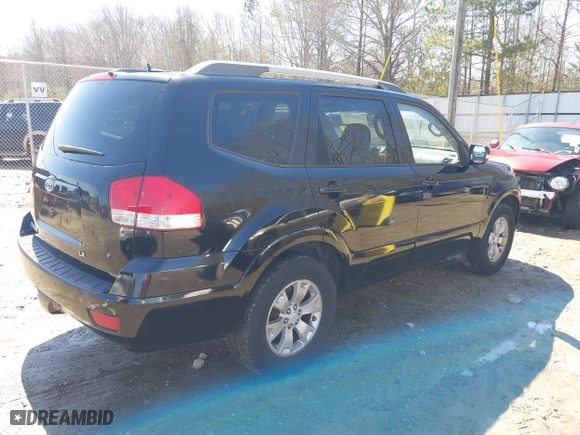 2009 Kia Borrego LX with VIN KNDJJ741995037531, listed as a IAAI auction lot 41738591 with 210,029 mi miles. Bid and sale history available at carsss.com. Image 4.