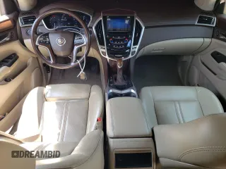 2015 Cadillac SRX Luxury Collection z VIN 3GYFNBE35FS534651, wystawiony jako Copart lot #59124955 z przebiegiem Nie podano mil oraz Szkoda całkowita • Salvage title. Historia ofert i sprzedaży dostępna na DreamBid. Obrazek 8.