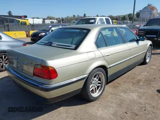 2000 BMW 7 Series 740iL with VIN WBAGH8340YDP13857, listed as a IAAI auction lot 41767665 with 194,786 mi miles. Bid and sale history available at carsss.com. Image 4.