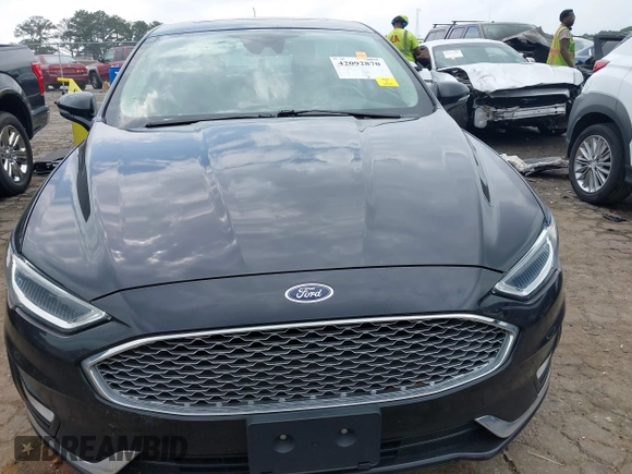 2019 Ford Fusion Titanium with VIN 3FA6P0SU1KR285161, listed as a IAAI auction lot 42092870 with 62,437 mi miles and . Bid and sale history available at DreamBid. Image 13.