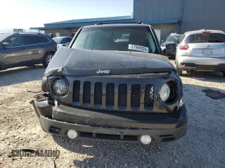2014 Jeep Patriot Latitude with VIN 1C4NJRFB5ED855888, listed as a Copart auction lot 57969355 with 113,196 mi miles and Salvage title. Bid and sale history available at DreamBid. Image 5.