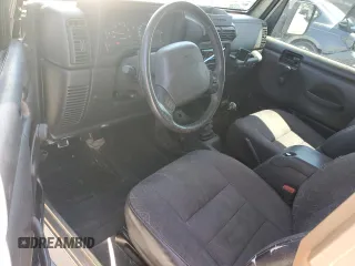 2002 Jeep Wrangler Sport with VIN 1J4FA49S72P765939, listed as a Copart auction lot 50615035 with 210,516 mi miles and Salvage Title. Bid and sale history available at carsss.com. Image 8.