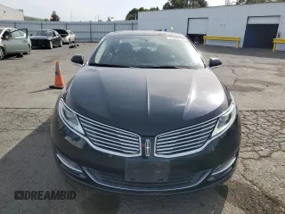 2014 Lincoln MKZ z VIN 3LN6L2GK6ER806741, wystawiony jako Copart lot #57455755 z przebiegiem 96 849 mil mil oraz Szkoda całkowita • Salvage title. Historia ofert i sprzedaży dostępna na DreamBid. Obrazek 5.