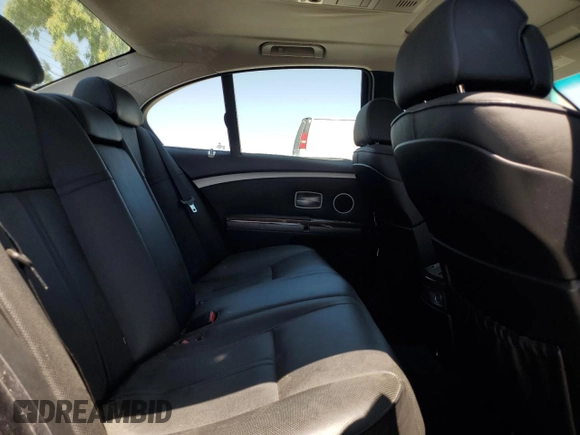 2006 BMW 7 Series 750i with VIN WBAHL83546DT02261, listed as a Copart auction lot 61686475 with 86,909 mi miles and Salvage title. Bid and sale history available at DreamBid. Image 10.