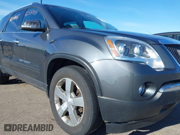 2012 GMC Acadia SLT1 z VIN 1GKKVREDXCJ284024, wystawiony jako IAAI lot #42337904 z przebiegiem 152 501 mil mil oraz . Historia ofert i sprzedaży dostępna na DreamBid. Obrazek 6.