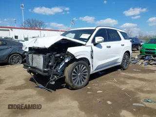 2024 Hyundai Palisade Calligraphy z VIN KM8R7DGE1RU760287, wystawiony jako IAAI lot #41901721 z przebiegiem 26 359 mil mil oraz . Historia ofert i sprzedaży dostępna na DreamBid. Obrazek 2.