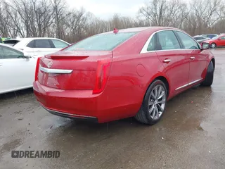 2013 Cadillac XTS z VIN 2G61N5S36D9129188, wystawiony jako IAAI lot #41824147 z przebiegiem 80 985 mil mil oraz . Historia ofert i sprzedaży dostępna na DreamBid. Obrazek 4.