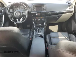 2015 Mazda CX-5 Grand Touring with VIN JM3KE4DY3F0496994, listed as a Copart auction lot 56093965 with 184,256 mi miles and Non Repairable. Bid and sale history available at DreamBid. Image 8.