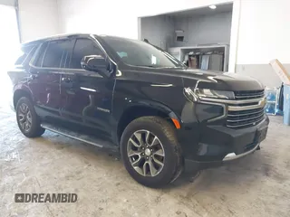 2021 Chevrolet Tahoe LT z VIN 1GNSKNKDXMR218505, wystawiony jako IAAI lot #41218178 z przebiegiem 50 326 mil mil oraz . Historia ofert i sprzedaży dostępna na DreamBid. Obrazek 1.