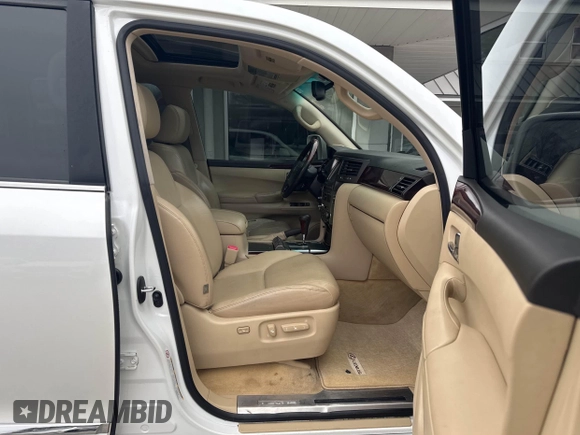 2011 Lexus LX 570 with VIN JTJHY7AX9B4071559, listed as a IAAI auction lot 41860921 with 201,449 mi miles and . Bid and sale history available at DreamBid. Image 5.