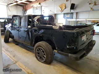 2023 Jeep Gladiator Overland with VIN 1C6HJTFG3PL514611, listed as a Copart auction lot 39195344 with 0 mi miles and Salvage Title. Bid and sale history available at carsss.com. Image 2.