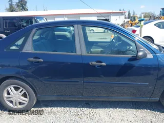 2002 Ford Focus SE with VIN 1FAFP34302W167735, listed as a IAAI auction lot 42056931 with 303,295 mi miles and . Bid and sale history available at carsss.com. Image 14.