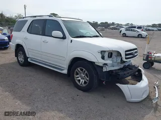 2004 Toyota Sequoia Limited with VIN 5TDZT38A04S236082, listed as a IAAI auction lot 41598592 with 104,042 mi miles. Bid and sale history available at carsss.com. Image 1.