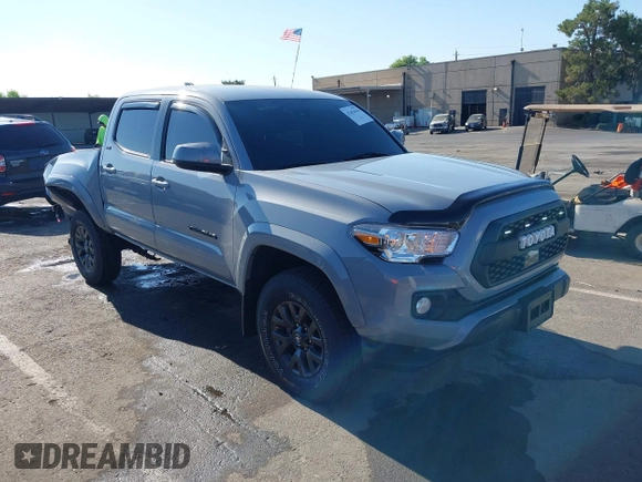 2021 Toyota Tacoma SR5 with VIN 5TFAZ5CN7MX101810, listed as a IAAI auction lot 42454418 with 58,930 mi miles and . Bid and sale history available at DreamBid. Image 1.