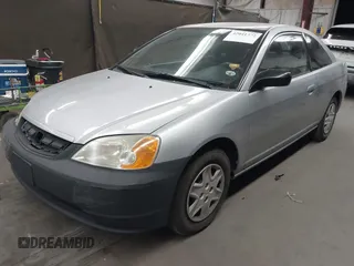 2003 Honda Civic LX with VIN 1HGEM22573L012729, listed as a IAAI auction lot 42041772 with 157,207 mi miles. Bid and sale history available at carsss.com. Image 17.