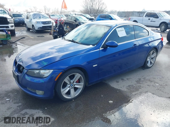 2007 BMW 3 Series 335i with VIN WBAWB73567P036617, listed as a IAAI auction lot 41618444 with 170,855 mi miles and . Bid and sale history available at DreamBid. Image 2.