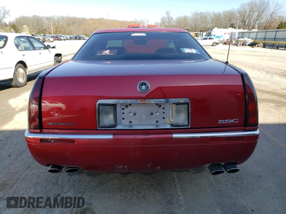 2002 Cadillac Eldorado z VIN 1G6EL12Y02B101569, wystawiony jako Copart lot #46216994 z przebiegiem 94 758 mil mil oraz Szkoda całkowita • Salvage title. Historia ofert i sprzedaży dostępna na DreamBid. Obrazek 6.