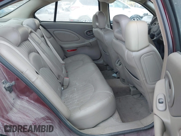 2001 Pontiac Bonneville SE z VIN 1G2HX54K914293726, wystawiony jako IAAI lot #41373612 z przebiegiem 120 117 mil mil oraz . Historia ofert i sprzedaży dostępna na DreamBid. Obrazek 8.