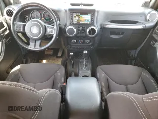 2014 Jeep Wrangler Unlimited Sahara with VIN 1C4BJWEG7EL228307, listed as a Copart auction lot 58663455 with 188,024 mi miles and Salvage title. Bid and sale history available at DreamBid. Image 8.