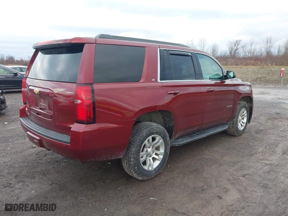 2020 Chevrolet Tahoe LT with VIN 1GNSKBKC1LR249131, listed as a IAAI auction lot 41084575 with 96,130 mi miles. Bid and sale history available at carsss.com. Image 4.