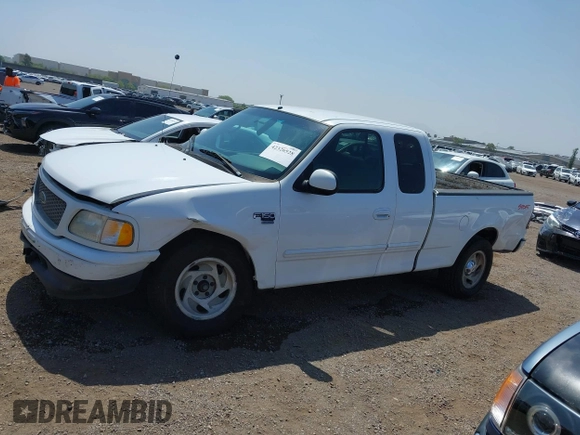 2000 Ford F-150 XL with VIN 1FTRX17L2YNA03263, listed as a IAAI auction lot 42326528 with Not provided miles and . Bid and sale history available at DreamBid. Image 14.