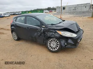 2014 Ford Fiesta Titanium z VIN 3FADP4FJ9EM110690, wystawiony jako Copart lot #48338625 z przebiegiem 175 441 mil mil oraz Szkoda całkowita • Salvage title. Historia ofert i sprzedaży dostępna na DreamBid. Obrazek 4.