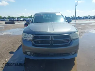 2013 Dodge Durango R/T z VIN 1C4SDHCT7DC564802, wystawiony jako IAAI lot #42348957 z przebiegiem 178 354 mil mil oraz . Historia ofert i sprzedaży dostępna na DreamBid. Obrazek 12.