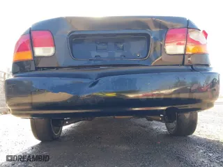 1997 Honda Civic LX with VIN 2HGEJ6670VH567081, listed as a IAAI auction lot 41995007 with 107,943 mi miles. Bid and sale history available at carsss.com. Image 6.