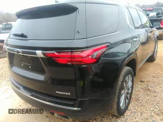 2023 Chevrolet Traverse Premier with VIN 1GNERKKW7PJ319982, listed as a IAAI auction lot 41534822 with 5,123 mi miles and . Bid and sale history available at DreamBid. Image 4.