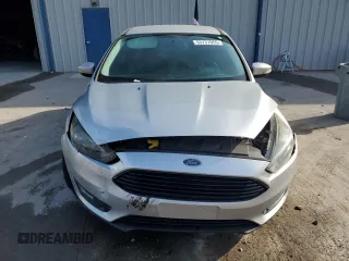 2017 Ford Focus SE with VIN 1FADP3FE9HL273889, listed as a Copart auction lot 53737055 with 114,700 mi miles and Salvage Title. Bid and sale history available at DreamBid. Image 5.