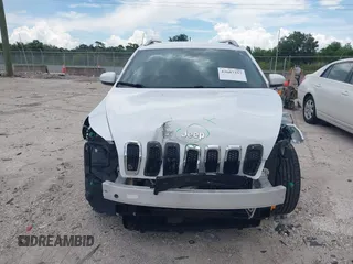 2017 Jeep Cherokee Limited z VIN 1C4PJLDB8HW596380, wystawiony jako IAAI lot #42607357 z przebiegiem 33 407 mil mil oraz . Historia ofert i sprzedaży dostępna na DreamBid. Obrazek 13.