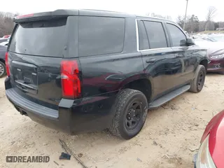2018 Chevrolet Tahoe Commercial with VIN 1GNLCDEC3JR221708, listed as a IAAI auction lot 41157325 with 163,845 mi miles. Bid and sale history available at carsss.com. Image 4.