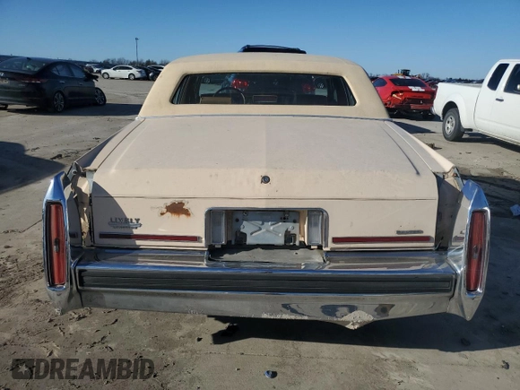 1988 Cadillac Brougham z VIN 1G6DW51Y9J9710161, wystawiony jako Copart lot #87093424 z przebiegiem 59 519 mil mil oraz Czysty tytuł • Clean title. Historia ofert i sprzedaży dostępna na DreamBid. Obrazek 6.